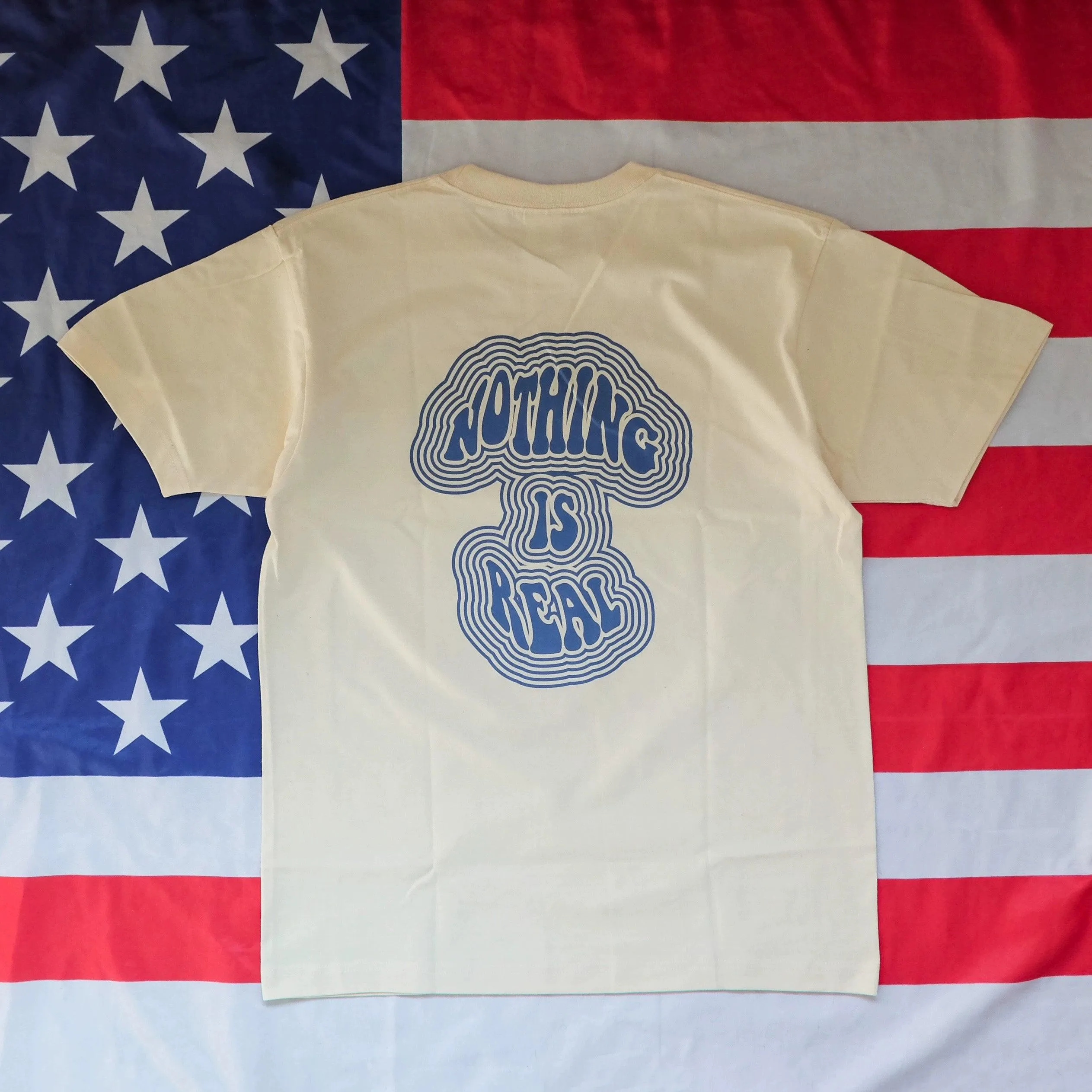 NOTHING IS REAL TEE