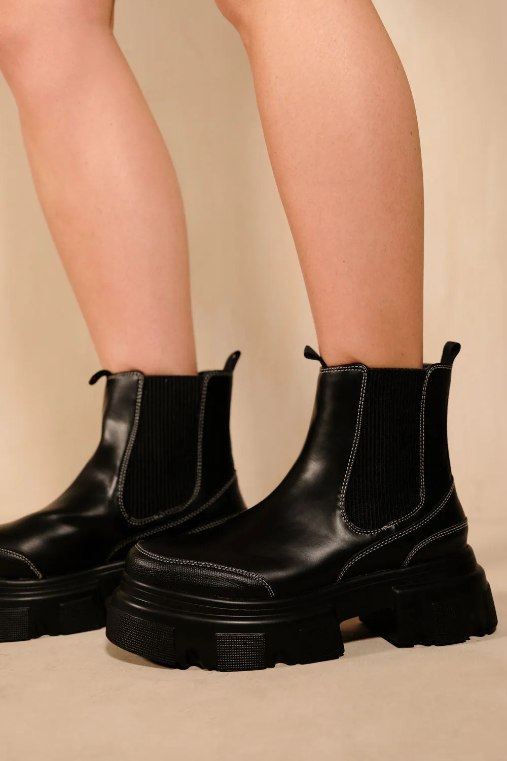 RAYNA CHUNKY SOLE CHELSEA ANKLE BOOTS IN BLACK FAUX LEATHER